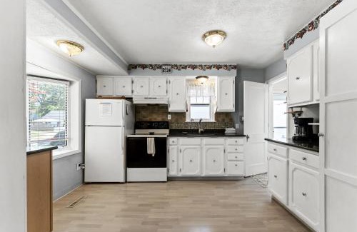 Lakeside House | Peaceful Pastel - Cheerful Cottage Close to Pere Marquette and Muskegon Lake - Pet Friendly