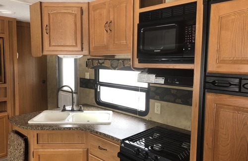 Onanole House | Pelican - Camper at Sunset Bay