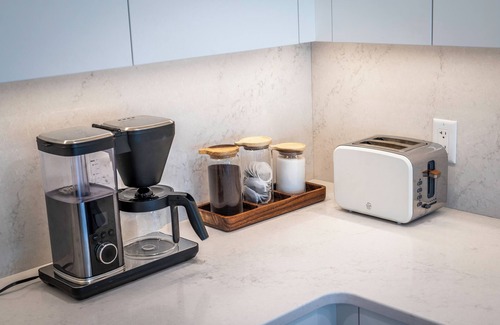 Kelowna Central Business District Condo | Penthouse Condo with vaulted ceiling on the Lakefront Downtown Kelowna