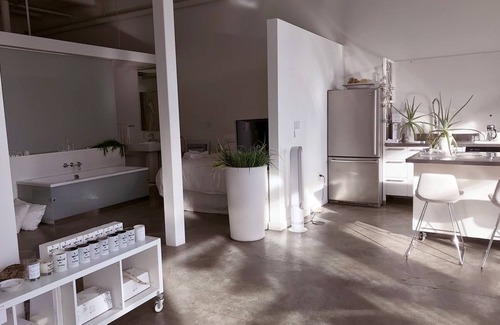 Gastown Condo | Penthouse loft with deck, rooftop and fireplace in historic Gastown, Vancouver.