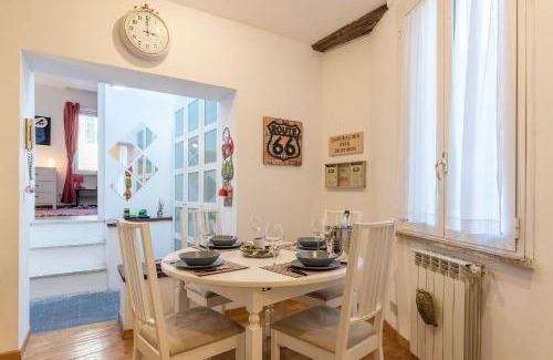 Rione XI Sant'Angelo Apartment | Penthouse with Terrace in the Heart of Rome