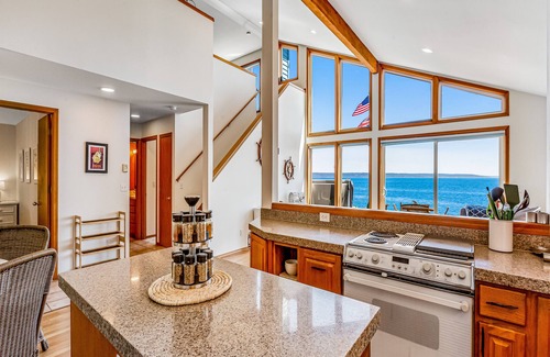 Clinton House | Perfect beach house with stunning views, hot tub & firepit - steps to the water