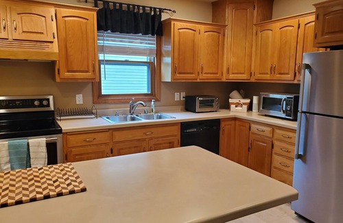 Weyauwega Cottage | Perfect family get-away with lake front property & sandy shores on White Lake