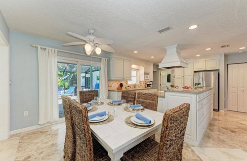 Anna Maria House | Periwinkle Getaway: 2 Blocks to the Beach, Private Pool by Anna Maria Life Vacation Rentals