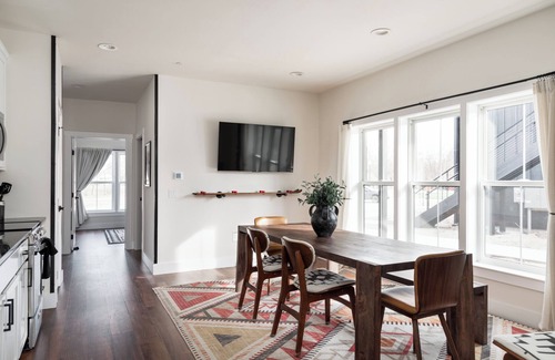 Bellaire Apartment | Pet-Friendly 2BR Family Suite in Boutique Resort w/Hot Tubs, Sauna, & Fire Pit!