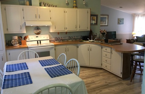 Ocean Isle Beach Cottage | Pet friendly, 3 bedroom, 2 bath, 2 piers, boat ramp, large porch, yard, waterway