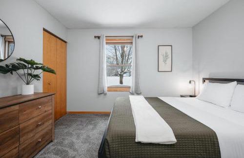 Grawn House | Pet Friendly 3BR 3BA Home near Traverse City with Game Room and Fenced Yard