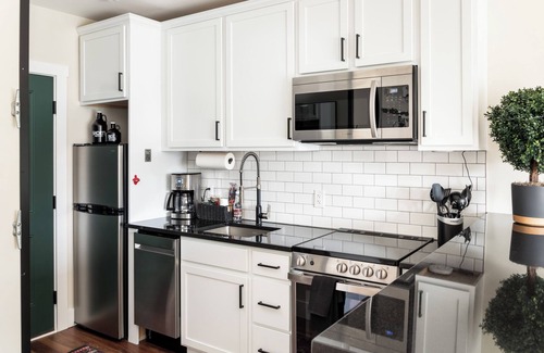 Bellaire Apartment | Pet-Friendly Studio in New Boutique Resort w/Hot Tubs, Sauna, Fire Pit, & More!