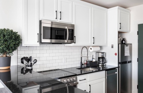 Bellaire Apartment | Pet-Friendly Studio in New Boutique Resort w/Hot Tubs, Sauna, Fire Pit, & More!