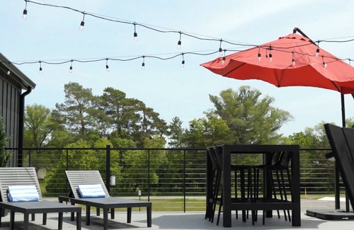 Bellaire Apartment | Pet-Friendly Studio in New Boutique Resort w/Hot Tubs, Sauna, Fire Pit, & More!