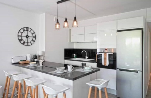 Orient Bay Apartment | Playa, modern apartment just a stone's throw from the beach!