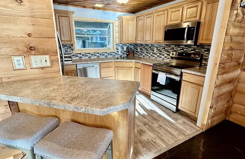 Brantingham House | Pleasant Lake House with private docks and large decks!