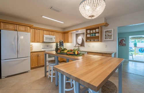 Caloosahatchee House | Poolside Paradise, 4BR Walkable Cape Coral Stay