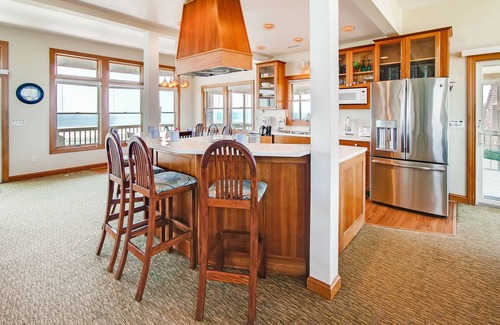 Buxton House | Premier Oceanfront Dog Friendly Home with Pool, Elevator, Hot Tub, and Tiki Bar