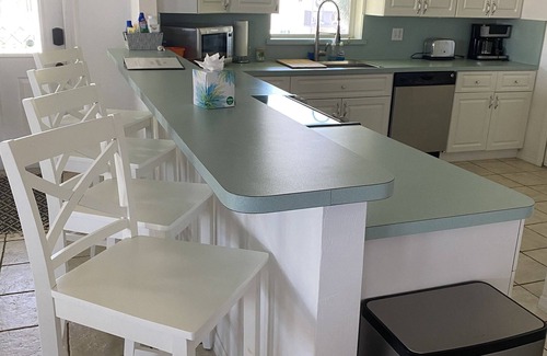 Goodland House | Premiere location on the water, walking distance to Stan's!