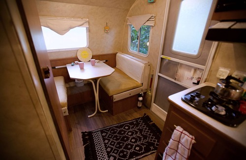 St. Augustine House | Priscilla's Hideaway. A beautiful retro camper in your own private pine forest.