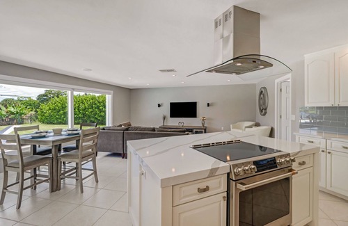 Palm River Estates House | Pristine Lake Home, Heated Pool, Gas Fire Pit, Fenced Yard