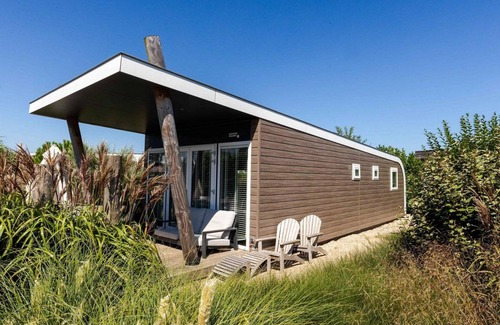 Nieuwvliet House | Privé Sauna, Luxe en Moderne Inrichting, Vaatwasmachine, Ruime Overkapte Lounge met Luxe Tuinmeubels