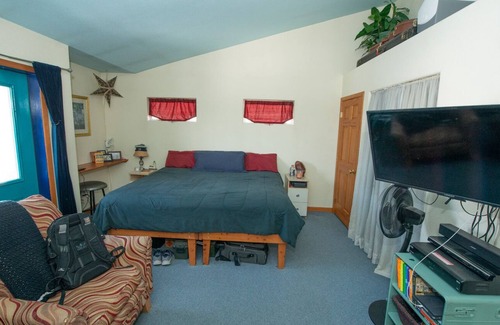 Bear Valley Bed & Breakfast | Private bedroom bath suite in large home, co-op kitchen Den Dog Ok