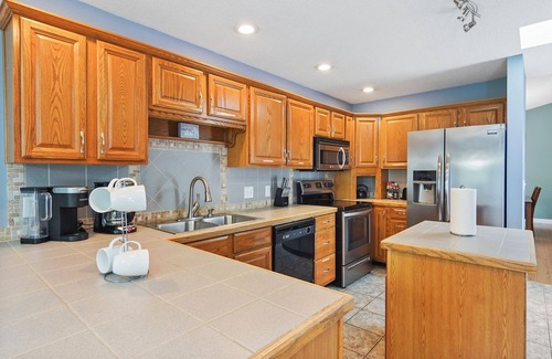 Terrell House | Private dock, hot tub, game room, paddle boat & fire pit!