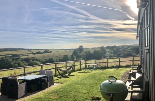 Bude Cabin | Private Hot Tub, Heating throughout plus Wood Burner, Rural & Sea Views