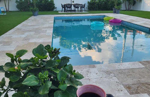 Boynton Beach House | Private saltwater pool, beach service perks, conveniently located! Dinner on us!