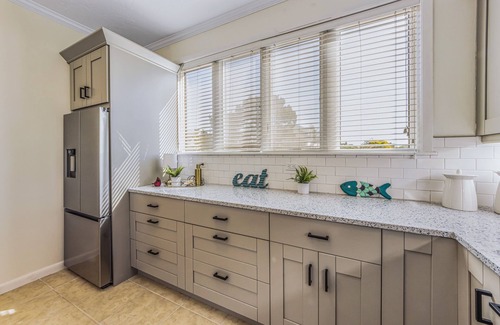 Whitney Beach House | Private townhome steps from the beach and right next to the pool