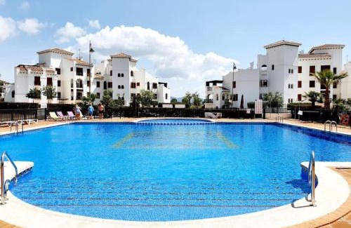 Caserio Los Tarquinos Apartment | Ptabaja. a pie de piscina en el Valle Golf Resort