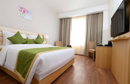 Dibrugarh Hotel | Pushkara Sarovar Portico Dibrugarh