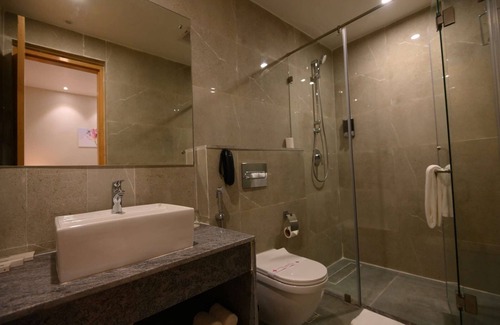 Dibrugarh Hotel | Pushkara Sarovar Portico Dibrugarh