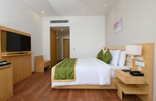 Dibrugarh Hotel | Pushkara Sarovar Portico Dibrugarh