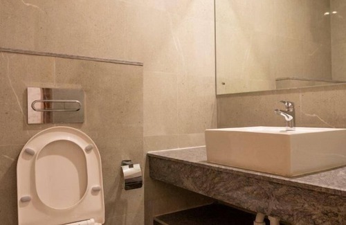 Dibrugarh Hotel | Pushkara Sarovar Portico Dibrugarh