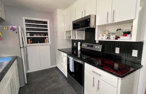 Cedar Hills House | Puzzle palace - Pet friendly house sleeps 7
