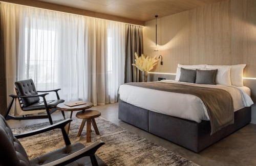 Tractorul Hotel | Qosmo Brasov Hotel