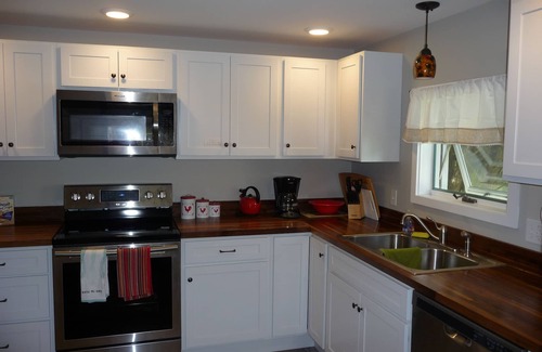 Northport House | Quaint and cozy village home. 2 blocks to town. Quiet and pet friendly Nice yard