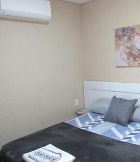 Uberaba House | Quarto com varanda e entrada independente