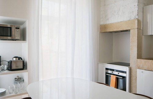 Santa Engracia Apartment | Quiet & Modern Apartment w/Garden by LovelyStay