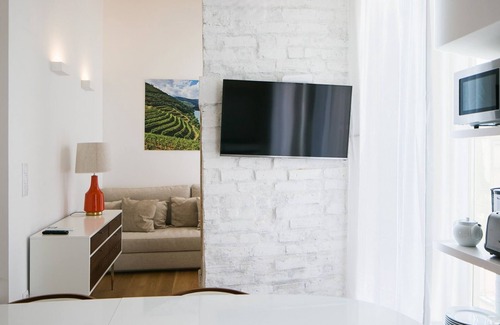 Santa Engracia Apartment | Quiet & Modern Apartment w/Garden by LovelyStay