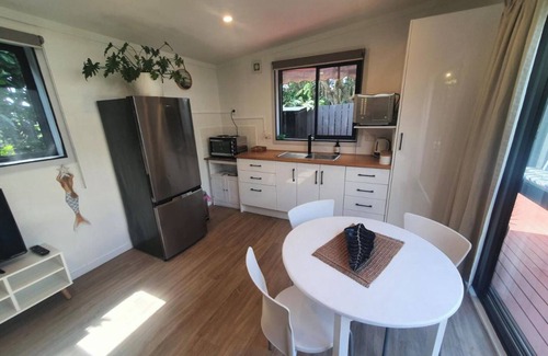 Red Beach Cottage | Red Beach Garden Cottage: Where cozy meets convenience!