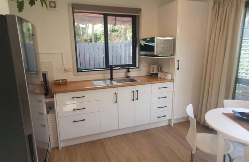 Red Beach Cottage | Red Beach Garden Cottage: Where cozy meets convenience!