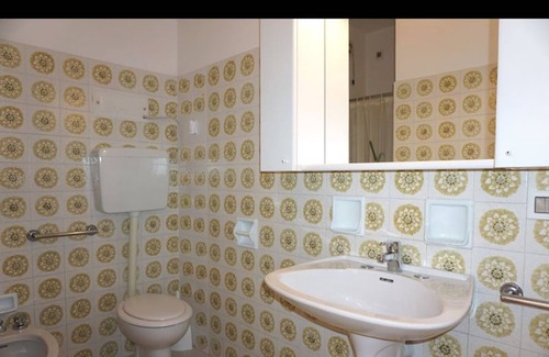 Porto Santa Margherita Apartment | Red flat with shared pool and private parking