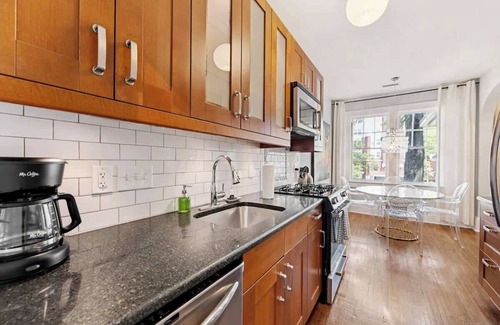 Cherry Condo | Refined Myers Park 2BR King Condo | Sunroom