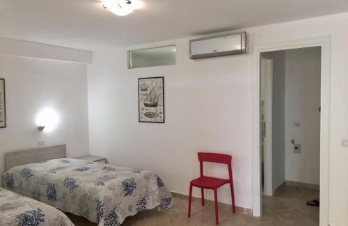 Porto Pozzo Apartment | Reihenhaus Nr. 8 mit Pool und super Meersicht