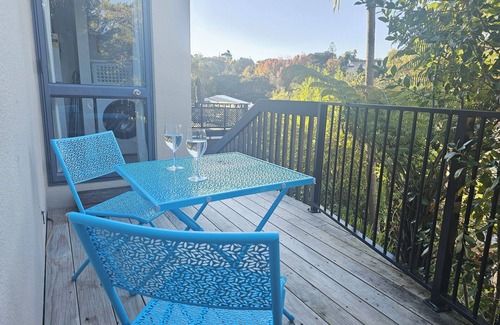 Long Bay Apartment | Relax and enjoy the North Shore in this cozy and stylish unit.
