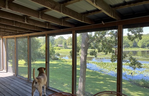 Warsaw House | Relax at Grandma’s house with a screened in porch overlooking a private lake!