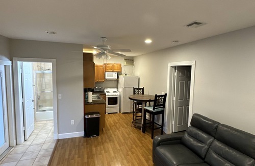 Palm City Cabin | Relax by the fire at The SmokenHouse cottage at the Ryan Holmes Ranch!