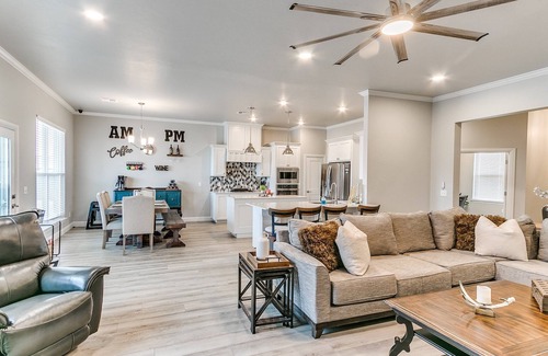 Yukon House | Relax & enjoy large private backyard with pool, hot tub & golf green!