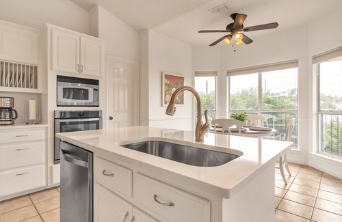 Travis Landing House | Relax in our beautiful backyard pool. Hop on Lake Travis at nearby marinas