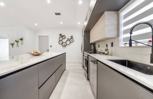 Richmond West House | Relax in Style: Pool, Golf, Luxe Kitchen, Sleeps 12