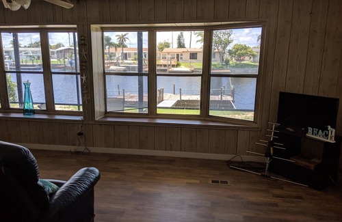 Port Richey House | Relax in your chair on the floating dock as the tide rolls in & catch a few fish